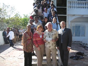 Students and faculty members from Leadership Academy in Tamarac, Florida, gather with chapter members in December to commemorate the school's award of $1,000 from the Science Teaching Tools program.